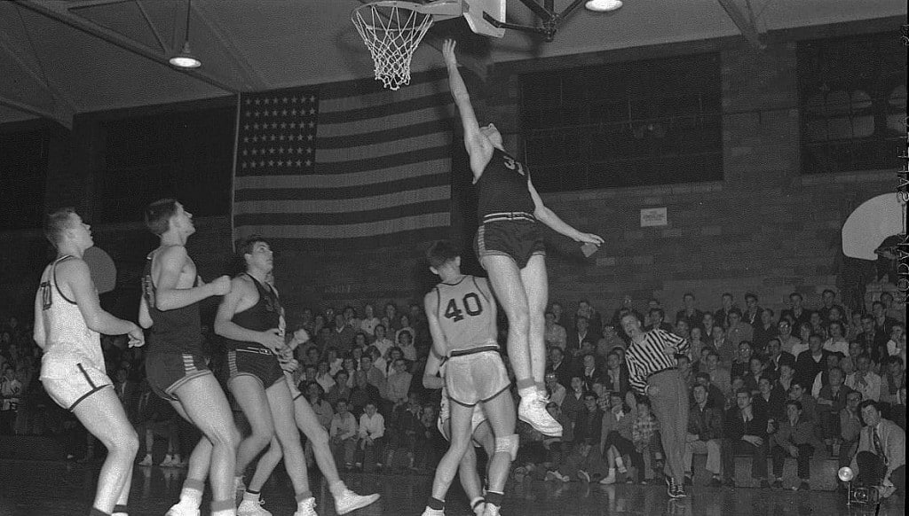 This is the first sports action photo ever taken by the late, longtime Republic-Times editor Bob Voris, that of Sonny West scoring on a layup for Waterloo High School as they defeated Belleville for the regional hoops title in 1952.