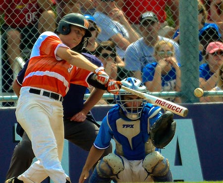 Waterloo's Cole Kaiping delivers the game-winning hit to left on Saturday. (John Spytek photo)
