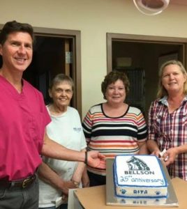 Pictured, from left, are Dr. Jeff Clinebell, 25-year volunteers Marge Lueking and Linda Meinhardt, and Dr. Rita Ryerson. Bellson Animal Hospital, 1400 Columbia Centre, will celebrate an open house 11 a.m. to 3 p.m. this Saturday. (submitted photo)