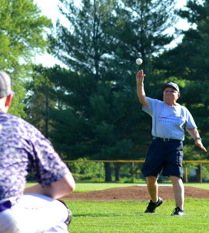 Bob Mohr throws out the ceremonial first pitch prior to Thursday's Valmeyer Junior Legion baseball game at Borsch Park. (Corey Saathoff photo)