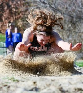 This photo taken by John Spytek of Waterloo High School's Hannah Finnerty landing a long jump in the sand during the 2015 track season won the Illinois Press Association award for Best Sports Photo on Friday.