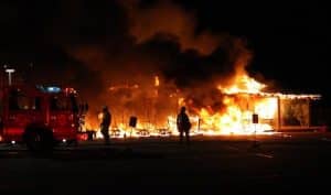 Firefighters work at the scene of an early morning fire at Mystic Oak golf course in Waterloo. (Kermit Constantine photo)