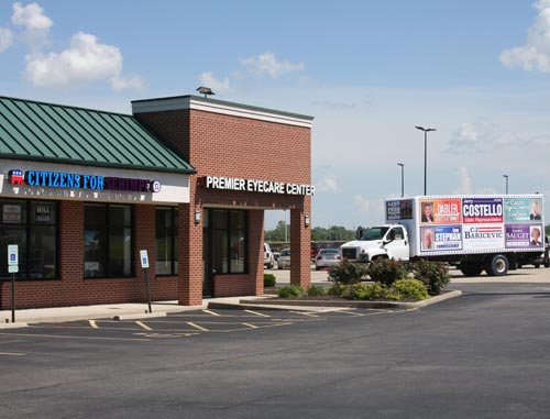 Parked around the corner from the office of state senate candidate Paul Schimpf (R-Waterloo) last week is one of the mobile signs that caused discord among Monroe County politicians.