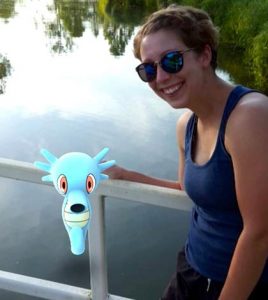 Pictured, Carolyn McManus poses with Horsea while she and her boyfriend, Cole Blechle, play Pokémon Go at Forest Park in St. Louis. (submitted photo)