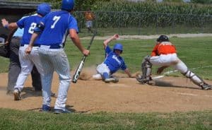 Columbia's Patrick Davis slides home safely during game one of Sunday's doubleheader against the St. Louis Printers at Kleinschmidt Field on Sunday. (Corey Saathoff photo)