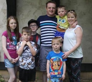 Pictured are the Foleys, front row, from left, Ryan, 7, and Jacob, 5; back row, Lauren, 14, Harry, 11, Patrick, Alex, 5, and Laurane. (Sean McGowan photo)
