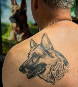 Monroe County Sheriff's Department Lt. Jim Lansing displays his tattoo of Sari. (Alan Dooley photo)