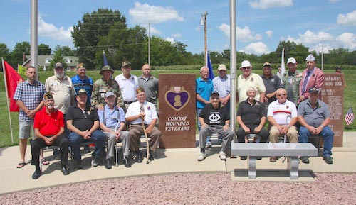 Pictured is the group of area Purple Heart recipients who were on hand during Sunday's dedication of a Purple Heart monument at Lakeview Park in Waterloo. (Kermit Constantine photo)