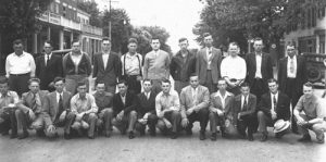 Pictured, 24 of Monroe County’s finest young men assemble for a group photo outside the draft center on Main Street in Waterloo on June 23, 1942. The men are preparing to board a bus to head to various services’ basic training. Eventually, about 13 million like them put on uniforms and fought in Europe or Asia. (submitted photo)
