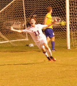 Gibault's Karson Huels celebrates after scoring a goal against Marquette. (John Hooser photo)