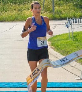 Kate Zucha of Waterloo placed first for women in Saturday's half marathon. (Alan Dooley photo)