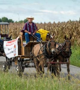 Dave Lehr’s wagon makes its way down Lemen Road near Burksville on the way to the Wm. Nobbe & Co. John Deere dealership. (Alan Dooley photos)