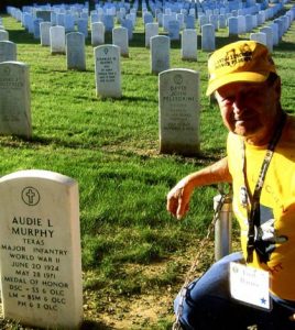 Fred Harres stopped to pay his respects to World War II veteran Audie Murphy at Arlington National Cemetery. Murphy was one of the most decorated American soldiers in WWII. (submitted photo)