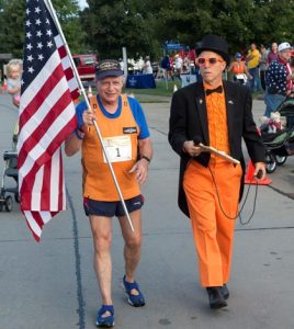 Pictured is retired U.S. Navy submariner Sid Busch with Hills and Hollows race organizer Marvin Fisher during Saturday's event in Valmeyer. (Alan Dooley photo) 