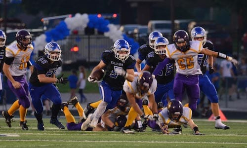 Columbia's Colton Byrd runs the ball Friday night against Carlyle. (John Spytek photo)