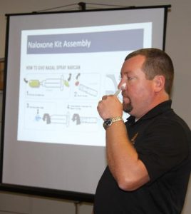 Pictured, Monroe County EMA Director Ryan Weber demonstrates how to administer Narcan during a training session for local first responders. (Sean McGowan photo)