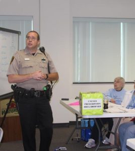 Pictured, Waterloo Police Department's Scott Spencer informs Senior Police Academy attendees about the dangers senior citizens face on the road, as well as what driving restrictions the elderly could be subjected to Oct. 12. (Sean McGowan photo)