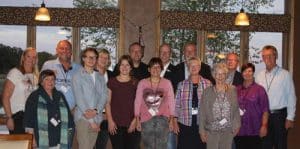 A delegation of 15 people from Porta Westfalica, Germany came to Waterloo for a five-day trip as part of the ongoing Sister Cities of Portaloo partnership between the two cities. Pictured are the German delegates during the welcome dinner at Waterloo Country Club on Monday. (Sean McGowan photo)