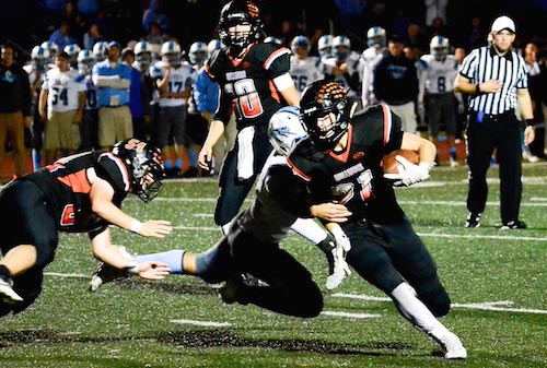 Waterloo's Scott Nanney runs the ball in overtime on Friday night. He would later score the winning touchdown. (John Spytek photo)