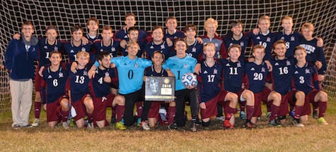 The Gibault soccer team poses with its sectional championship plaque following Friday's win over Althoff. (John Spytek photo)