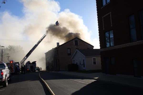 Pictured, firefighters attempt to extinguish a fire at Hopskeller Brewing Company in Waterloo on Sunday morning. (Kermit Constantine photo)