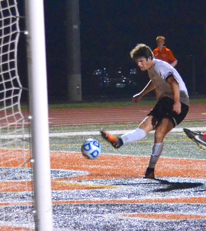 Waterloo's Ben Huels attempts a shot on goal during Friday's sectional final against Jacksonville. (Corey Saathoff photo)