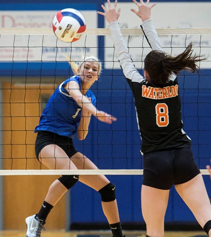 Columbia's Shea Bradshaw slams home a winning point against Waterloo in the regional final on Thursday. For more photos from the match, visit www.republictimes.net/photo-store. (Alan Dooley photo)
