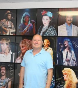 Steve Straub displays some of the photos he took at Fox Theater in his office at Nolkemper Insurance in Columbia. (Sean McGowan photo)
