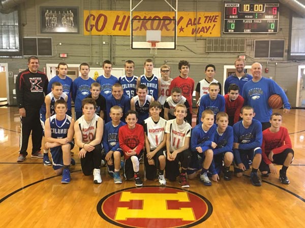 Pictured, players and coaches from the Columbia Middle School and Knightstown basketball teams gather on the court inside the historic Hoosier Gym. (submitted photo)