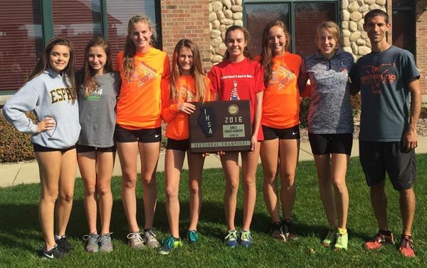 Waterloo High School cross country runners with their sectional championship plaque.