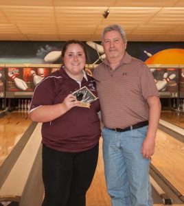 Dupo's Courtney Argus posted the highest average (225) for the girls at the Kegler Challenge in Columbia. She is pictured with Columbia bowling coach Keith Jeffrey, who organized the tournament.