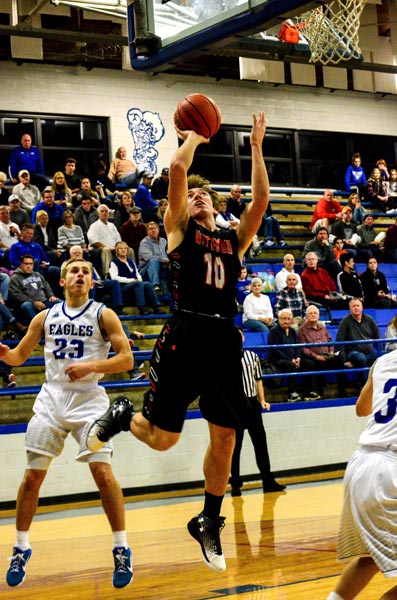 Waterloo's Ross Schrader goes up for a shot against Columbia on Monday. (John Spytek photo)