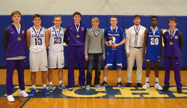 photo caption: Pictured are players named to the all-tournament team of the Freeburg Holiday Tournament, which include (second, third and fourth from left) Columbia's Greg Long, Jordan Holmes and Valmeyer's Michael Chism. Not pictured is Waterloo's Dylan Hunt. (Corey Saathoff photo)