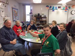 Pictured at the family Christmas luncheon, clockwise, are Jonathan Whelan, Jonathan’s maternal grandparents Dale and Carol Stumpf, his aunt Sandy Harvaugh and adopted grandparents Barbara and Charlsie from Reflections. (submitted photo)