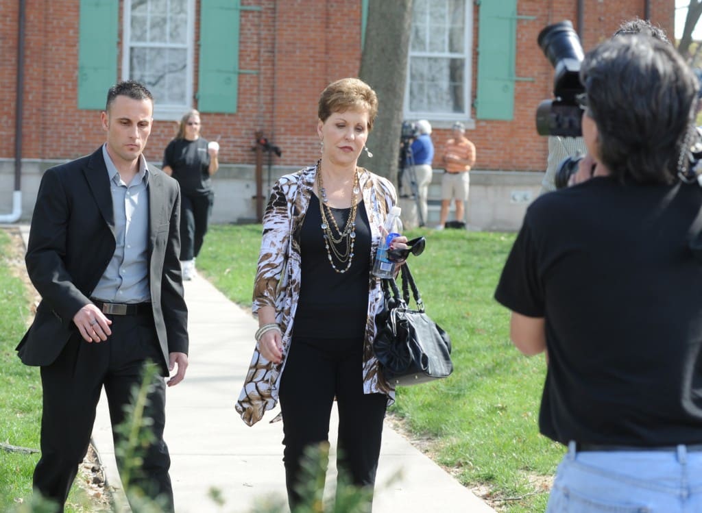 Pictured with her bodyguard, televangelist Joyce Meyer leaves the Monroe County Courthouse after giving her deposition in the Chris Coleman murder trial in 2011.