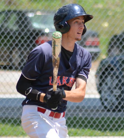 Valmeyer's John Wuelling watches as his home run clears the fence at Borsch Park during a recent game against Belleville. (Corey Saathoff photo)