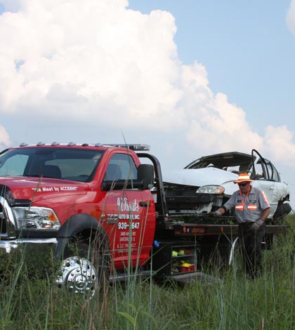 Pictured is the vehicle involved in the crash being loaded onto a Wheat's Towing truck. (Sean McGowan photo)