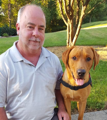 Dave Eustis recently brought home a service dog named Zeke to help him with is handicap. (submitted photo)