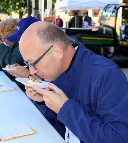 Porta Westfalica Bürgermeister Bernd Hedtmann serves as a judge of the pumpkin baking contest during Saturday’s Waterloo PumpkinFest along with Gateway Restaurant Supply owner John Wolz, Monroe County Circuit Clerk Sandy Sauget and Gibault Men’s Club President Don Francescon. 
(Kermit Constantine photo)