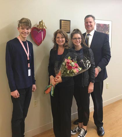 Pictured at Paula Hutchinson’s final day of radiation treatment, from left, Cameron, Paula, Morgan and Kevin Hutchinson celebrate with Paula ringing the bell at Siteman Cancer Center south of Butler Hill Road in St. Louis. (submitted photo)