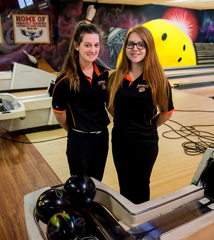 Pictured, from left, are Waterloo High School seniors Makensy Umscheid and Kristen Goersch. Both advanced to the sectional round as individuals. (Alan Dooley photo)