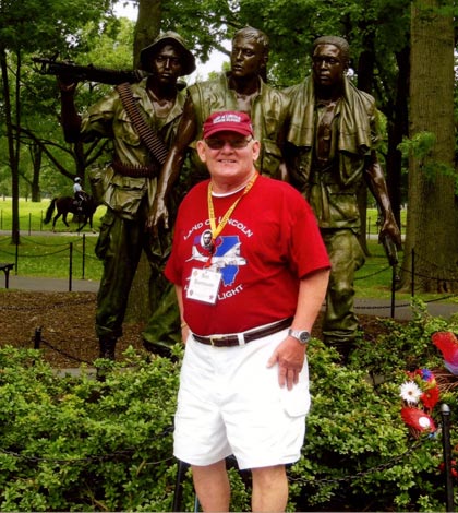 Pictured, Ron Biermann explores the Vietnam Veterans Memorial that includes “The Three Servicemen” statue. The statue represents the diversity among servicemen with a Caucasian, African American and Latino American. (submitted photo)