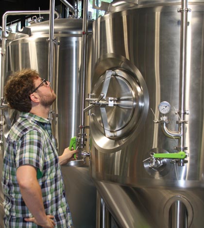 Matt Schweizer highlighted Hopskeller’s new and larger brewing equipment as one of the more exciting aspects of the Waterloo microbrewery’s rebirth. 
(Sean McGowan photo)