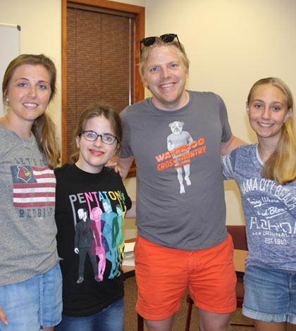 Pictured, from left, are WJHS reading teacher Melissa Meyers, Sophia Spencer, WJHS reading teacher Andy Mayer and Grace Maus during a recent summer “Books and Bagels” event at Morrison-Talbott Library. (Sean McGowan photo)