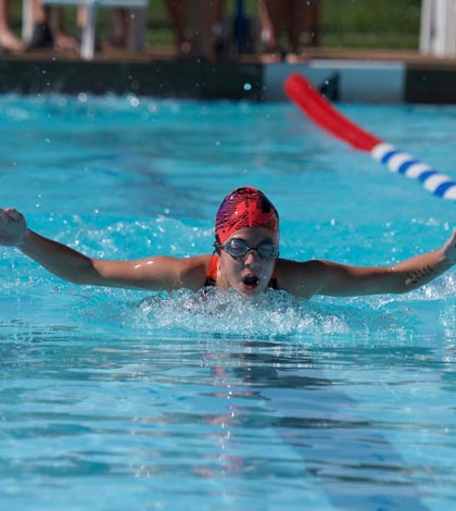 Pictured, Piranhas swimmer Olivia Most competes in a recent meet at Columbia. (John Hooser photo)
