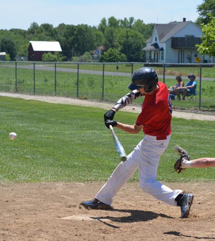 Valmeyer's John Wuelling takes a swing during a game earlier this summer at Columbia. (Corey Saathoff photo)