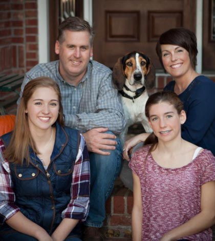 Pictured are John and Jen Traube with daughters Meredith and Emily. (submitted photo)