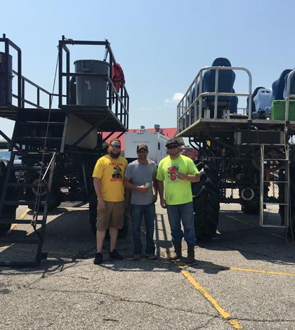 Pictured, from left, are Michael Heidenreich, Jared Kirkendoll and Scott Green standing in front of the swamp buggies they brought to Texas to assist with Hurricane Harvey relief efforts. 
(submitted photo)