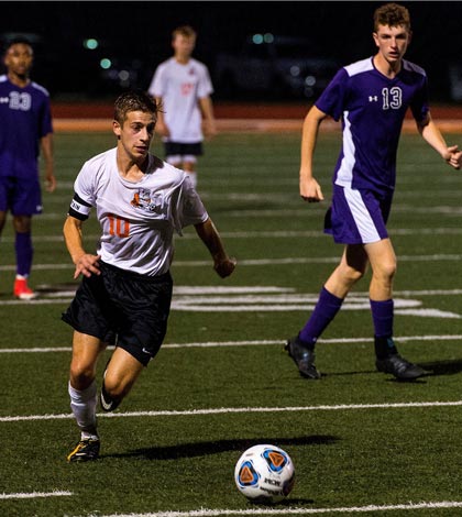 Waterloo's Caden Gordon moves the ball ahead during a recent game against Mascoutah. (Alan Dooley photo)