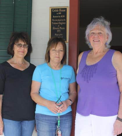 Pictured, from left, Randolph County Historical Society treasurer Rose Dashner, RCHS president Colleen Schilling and Hoodoo Priestess Julie Gangloff are coordinating the first Creole House and Village Haunting Memory Walk set for this Friday night in Prairie du Rocher. (Sean McGowan photo)